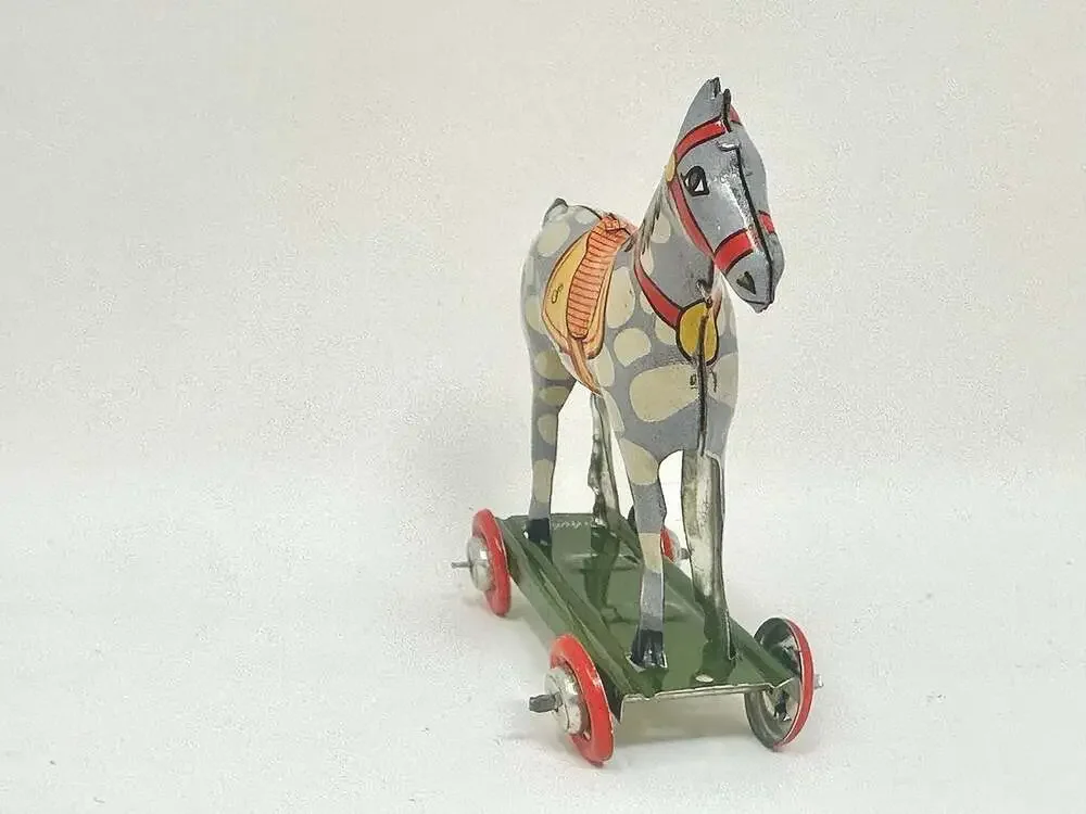 Miniature Tin Toy Horse on Wheels Vintage Penny Toy Ornament by Schylling